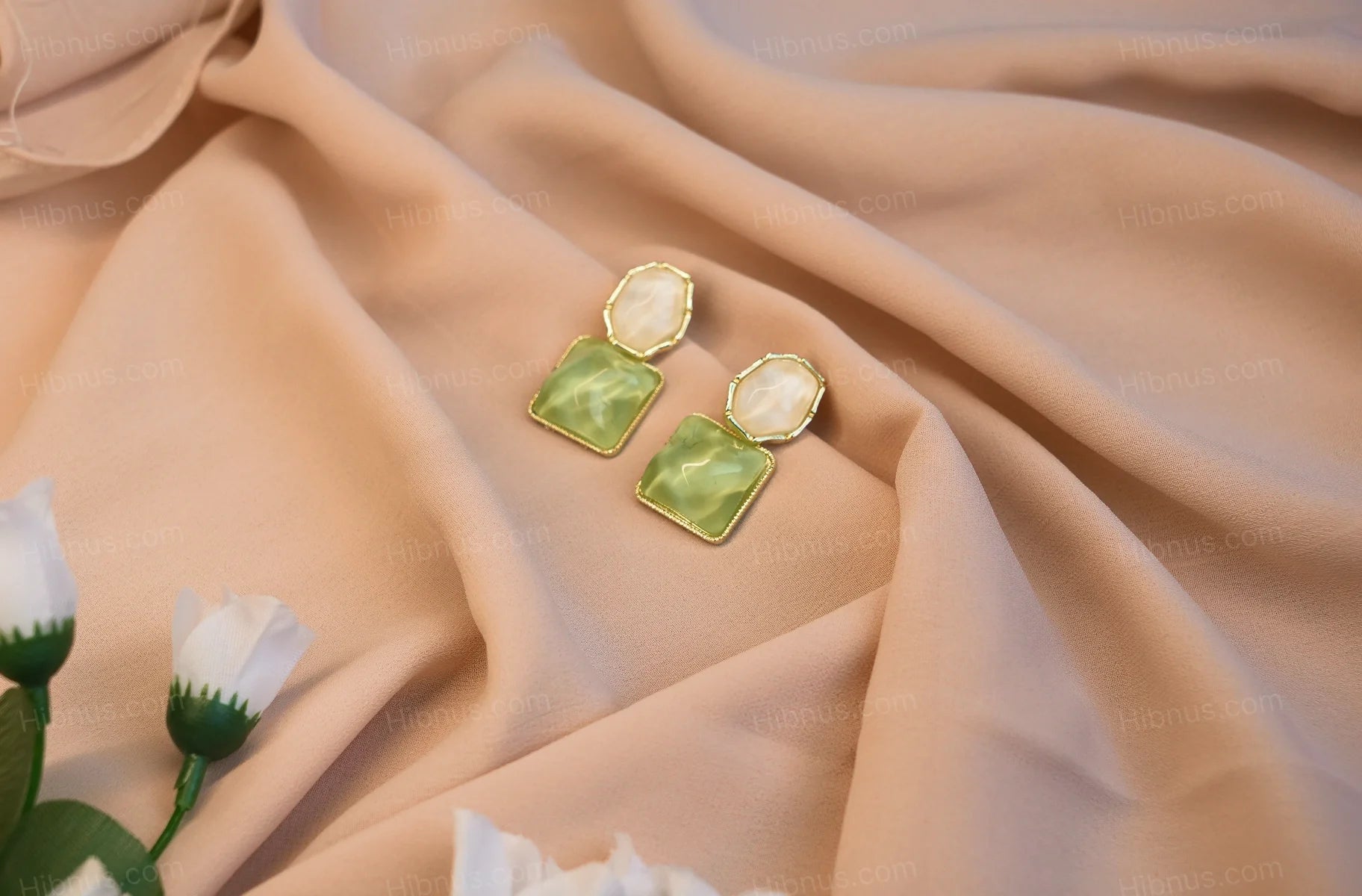 Asymmetrical diamond-shaped earrings